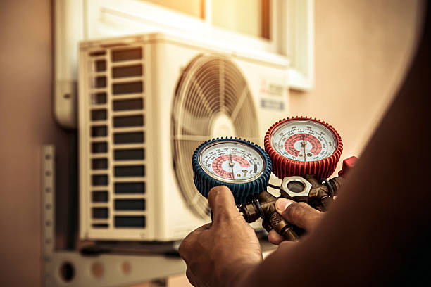 Professional Air Conditioning Service technician working in Temple, GA